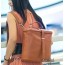 orange backpack leather purse