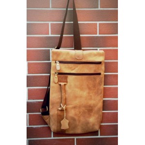 brown leather strap bag